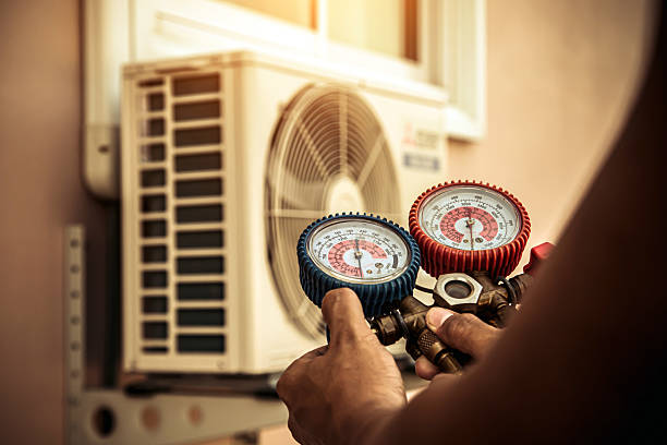 Professional Air Conditioning Service technician working in Hatboro, PA